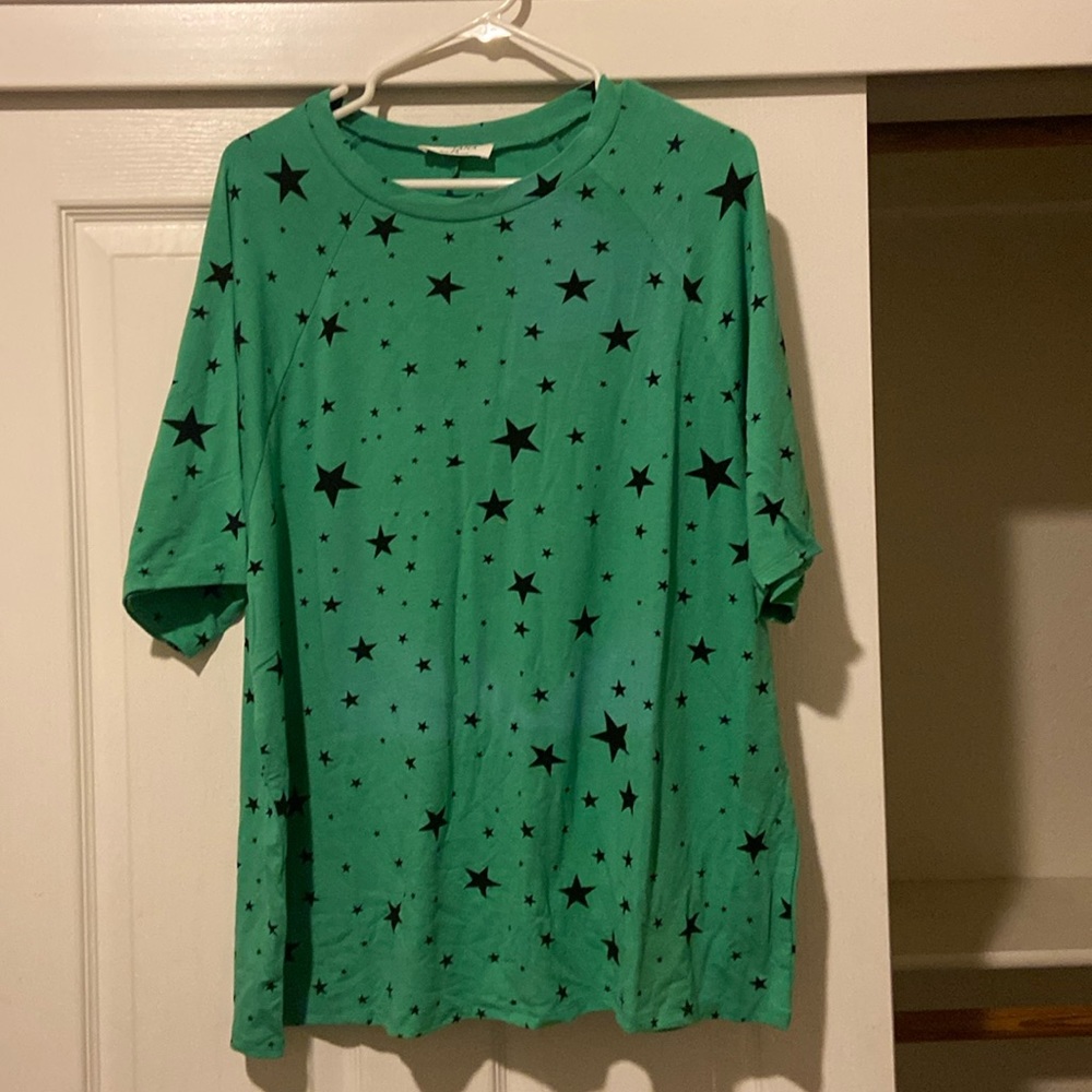 Green shirt with stars